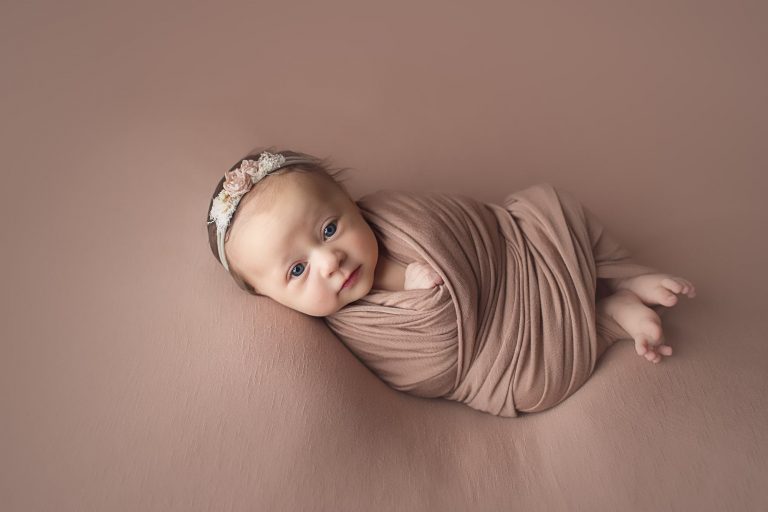 Photographing older newborns in a studio session