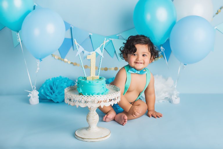 blue and gold cake smash photo session for a baby boy. Portrait studio in Randolph NJ.