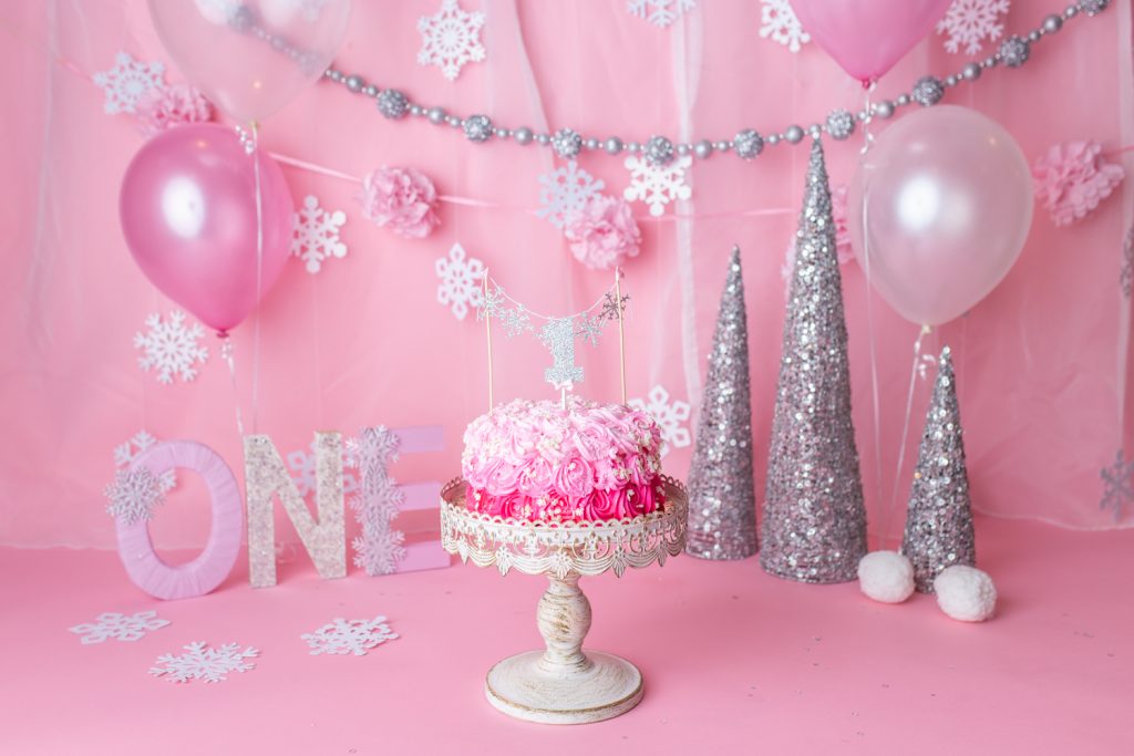 beautiful and sparkly props for a winter onederland cake smash for a baby girl.
