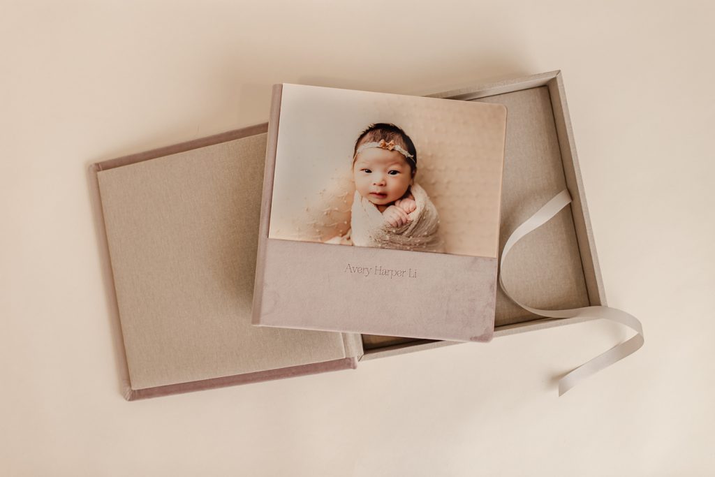 Custom photo album with photo cover and matching box set; showcasing professional artwork available through the studio.